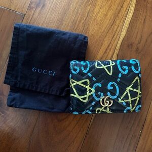 Gucci Black Leather Wallet with Gold Accent